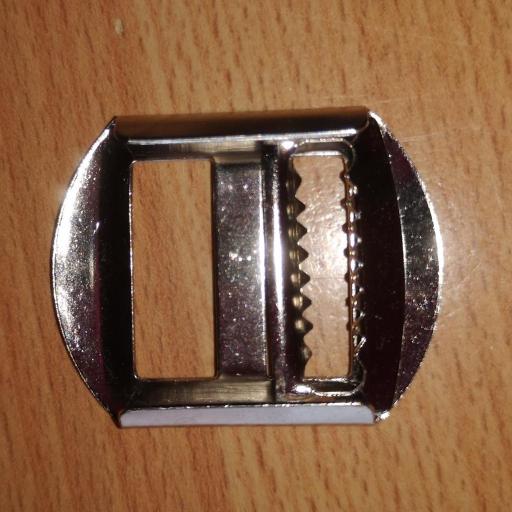 Metal strap buckle/tensioner