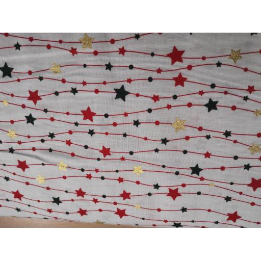 Red, green and ivory stars Christmas poplin