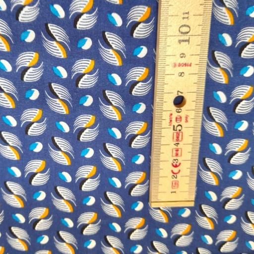 Ying Yang blue viscose print. Blue background with back,white and mustard yellow print