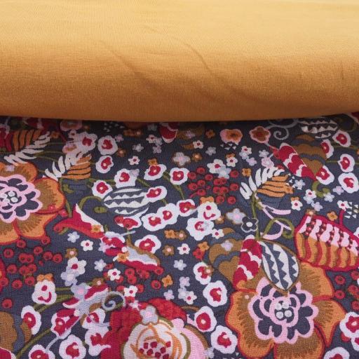 Flower power french terry. grey with natural , mustard and multi coloured floral print. teamed with ochre linen