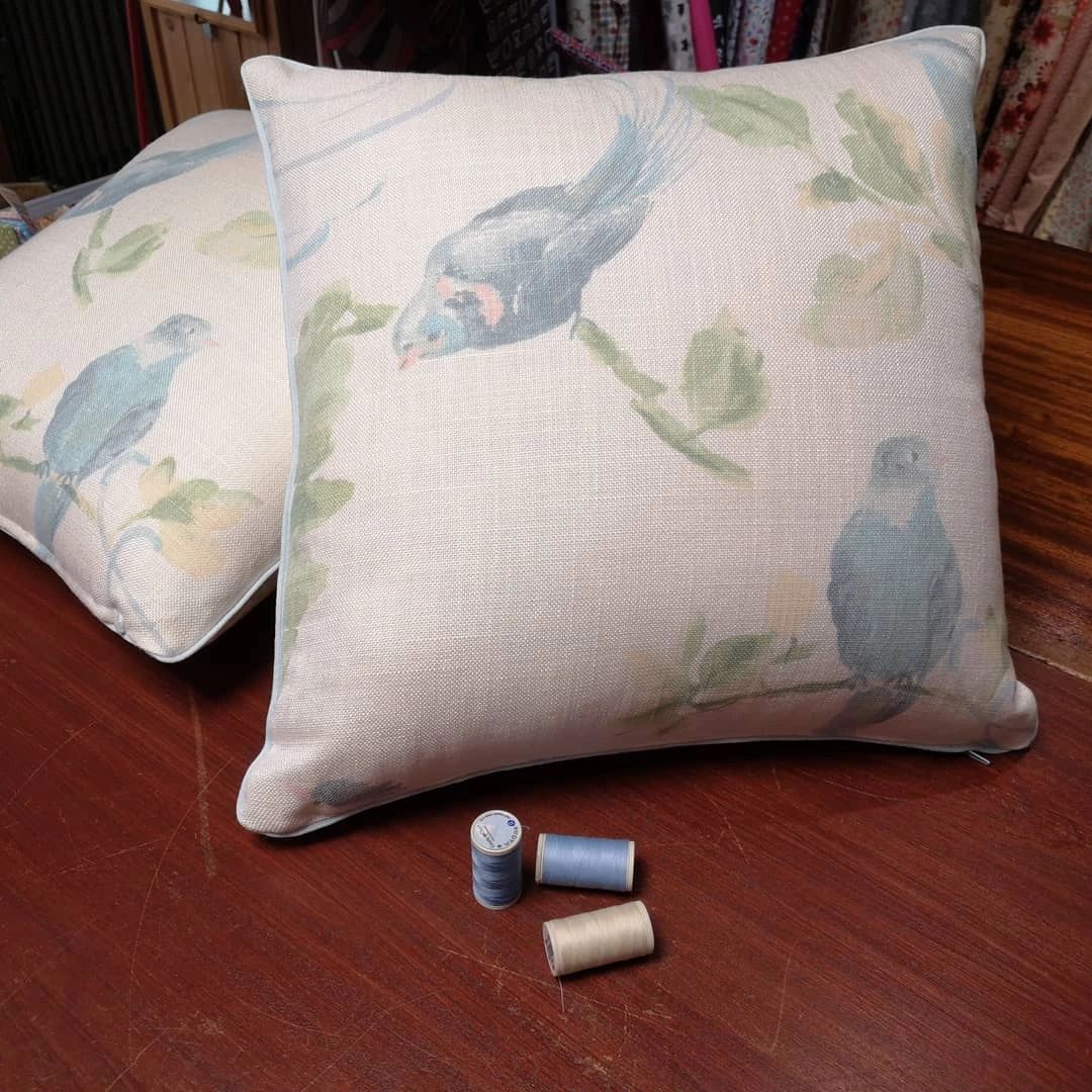 Pattern matched cushions, with piping. These matched cushions are same on the front and back. 