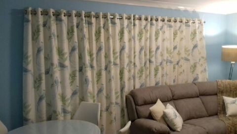 Eyelet curtains with heavy thermal linings 